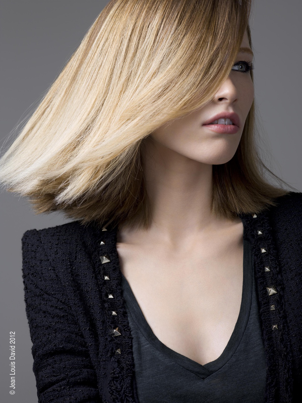 Strakke blonde bob met glans bij Het Kappershuis Bel